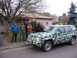 Employees from Shonnard's Nursery, Florist and Landscape in Corvallis, Oregon, hold a Gorilla Landscape at a home in Corvallis.